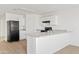 Open kitchen featuring appliances, ample counter space, and a modern aesthetic at 148 E Douglas Ave, Coolidge, AZ 85128