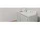 Dedicated laundry area with modern white washer and dryer at 148 E Douglas Ave, Coolidge, AZ 85128