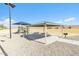 Neighborhood playground featuring picnic tables and play area for outdoor fun and gatherings at 148 E Douglas Ave, Coolidge, AZ 85128