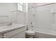 Bright bathroom featuring a tub shower and a white vanity with sink at 17642 W Sanna St, Waddell, AZ 85355