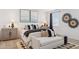 Well-decorated bedroom showcasing coordinated decor and an area rug at 17642 W Sanna St, Waddell, AZ 85355