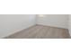 Cozy bedroom with neutral carpet and bright, white walls at 17642 W Sanna St, Waddell, AZ 85355