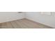 Neutral carpet bedroom with bright white walls and baseboards at 17642 W Sanna St, Waddell, AZ 85355