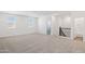 Bright bonus room features plush carpet and abundant natural light from windows at 17642 W Sanna St, Waddell, AZ 85355