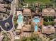 This aerial view showcases the community's clubhouse pools, lounging areas, and beautifully designed layout for ultimate relaxation at 18491 N 98Th Way, Scottsdale, AZ 85255