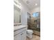 Modern bathroom features a glass-enclosed shower with decorative tile work at 18491 N 98Th Way, Scottsdale, AZ 85255