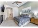 Calm bedroom with a fireplace and comfortable furnishings at 18491 N 98Th Way, Scottsdale, AZ 85255