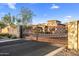 Elegant gated entrance to the community; secure and picturesque with stone pillars at 18491 N 98Th Way, Scottsdale, AZ 85255