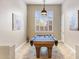 Bright game room featuring a pool table and charming artwork at 18491 N 98Th Way, Scottsdale, AZ 85255