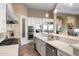 Kitchen with white countertops, stainless steel appliances, and pendant lighting at 18491 N 98Th Way, Scottsdale, AZ 85255