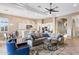 Open-concept living area with a kitchen and a comfortable seating arrangement at 18491 N 98Th Way, Scottsdale, AZ 85255