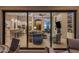 Open floor plan flows to kitchen and living area; view from the outdoor patio at 18491 N 98Th Way, Scottsdale, AZ 85255