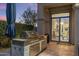 Gourmet outdoor kitchen with stainless steel grill and sleek design; perfect for alfresco dining at 18491 N 98Th Way, Scottsdale, AZ 85255