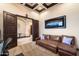 View of the office from the doorway showing the office set up with desk and couch at 19717 E Country Meadows Dr, Queen Creek, AZ 85142