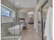 Bright bathroom with a soaking tub, fireplace, and walk-in shower at 2008 E Rock Wren Rd, Phoenix, AZ 85048