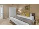 Inviting bedroom with neutral tones, featuring a comfortable bed and closet at 2008 E Rock Wren Rd, Phoenix, AZ 85048