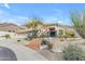 Inviting two-story home with landscaped front yard and brick steps leading to the entrance at 2008 E Rock Wren Rd, Phoenix, AZ 85048