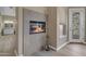 Modern living room with a tiled fireplace and access to outdoor living space at 2008 E Rock Wren Rd, Phoenix, AZ 85048