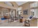 Open-concept living room features comfortable seating, high ceilings, and lots of natural light at 2008 E Rock Wren Rd, Phoenix, AZ 85048