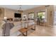 Bright living room featuring a fireplace, natural light, and stylish decor at 2008 E Rock Wren Rd, Phoenix, AZ 85048