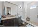 Stylish bathroom featuring a glass-enclosed shower, modern vanity, and sleek fixtures at 22372 E Duncan St, Queen Creek, AZ 85142