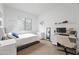 Well-lit bedroom with a dedicated desk area, perfect for work or study at 22372 E Duncan St, Queen Creek, AZ 85142