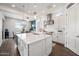 Spacious kitchen with a large island, stainless steel appliances and a breakfast nook at 22372 E Duncan St, Queen Creek, AZ 85142