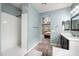 Updated bathroom featuring a stand up shower, vanity and tile flooring at 2336 W Magdalena Ln, Phoenix, AZ 85041