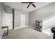 Spacious bedroom featuring neutral walls, carpet and a ceiling fan at 2336 W Magdalena Ln, Phoenix, AZ 85041