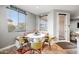 Cozy breakfast nook featuring a built-in bench and large windows at 2336 W Magdalena Ln, Phoenix, AZ 85041