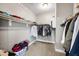 Walk-in closet with shelving and ample storage space for clothes and accessories at 2336 W Magdalena Ln, Phoenix, AZ 85041