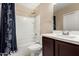 Bathroom featuring a white shower/tub combo, single vanity, and toilet at 240 W Juniper Ave # 1053, Gilbert, AZ 85233