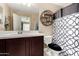 Bathroom featuring a single vanity, toilet, and a shower/tub combo with a patterned shower curtain at 240 W Juniper Ave # 1053, Gilbert, AZ 85233