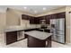 Modern kitchen featuring stainless steel appliances and granite countertops with lots of natural light at 240 W Juniper Ave # 1053, Gilbert, AZ 85233