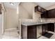 Kitchen featuring stainless steel appliances, granite countertops, and tile flooring at 240 W Juniper Ave # 1053, Gilbert, AZ 85233