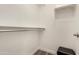 A walk-in closet with a built-in shelf and rod at 240 W Juniper Ave # 1053, Gilbert, AZ 85233