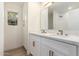 Stylish bathroom featuring double sinks with modern fixtures and sleek cabinetry at 2416 S Evergreen Rd, Tempe, AZ 85282