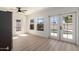 Bright breakfast nook with black refrigerator and view of the pool through the french doors at 2416 S Evergreen Rd, Tempe, AZ 85282
