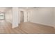 Open-concept living space with modern floors, and white walls at 2416 S Evergreen Rd, Tempe, AZ 85282