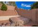 Landscaped backyard with outdoor patio at 25425 N 64Th Ave, Phoenix, AZ 85083