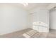 A cozy bedroom featuring neutral carpet and a ceiling fan for added comfort at 25425 N 64Th Ave, Phoenix, AZ 85083