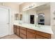 Bathroom features a double vanity, closet and views of the bedroom at 25695 W Crown King Rd, Buckeye, AZ 85326