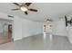 Empty bedroom showcasing neutral colors and a view to the backyard at 302 E Carol Ann Way, Phoenix, AZ 85022