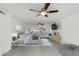 Bright and spacious main bedroom features an ensuite bathroom and ceiling fan at 302 E Carol Ann Way, Phoenix, AZ 85022