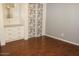This bedroom has a chest of drawers with a mirror and closet with patterned sliding doors at 303 S Recker Rd # 62, Mesa, AZ 85206