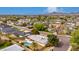 Aerial view of a residential neighborhood with mature trees and desert landscaping at 4249 E Mitchell Dr, Phoenix, AZ 85018