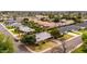 Aerial view of a home with mature trees and desert landscaping located on a corner lot at 4249 E Mitchell Dr, Phoenix, AZ 85018