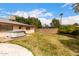 An outdoor hot tub sits in a well-maintained fenced backyard at 4249 E Mitchell Dr, Phoenix, AZ 85018