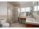 This bathroom features a white sink, a shower, and a toilet at 4249 E Mitchell Dr, Phoenix, AZ 85018