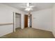 A basic bedroom featuring neutral paint and closet space at 4249 E Mitchell Dr, Phoenix, AZ 85018